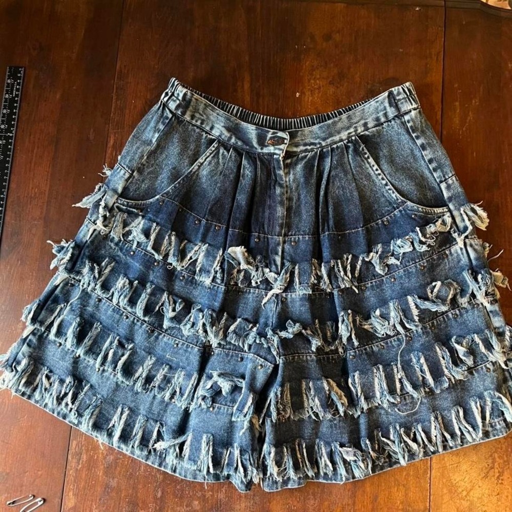 y2k grunge distressed denim fringe shorts skort studded festival statement piece